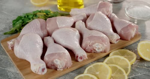 Raw Chicken Drumsticks with Cilantro and Lemon