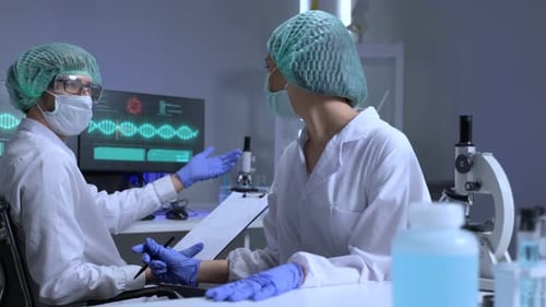 Scientists Working in a Modern Lab Setting