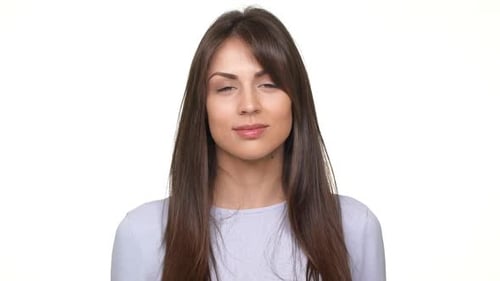 Woman Portrait Smiling Against a White Background