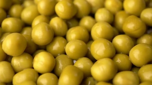 Green Pickled Peas Rotate Background.