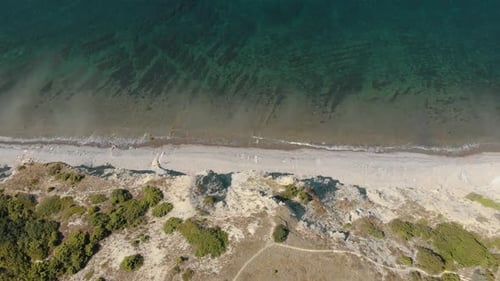 Aerial View of Beach, a Tropical Forest and Ocean with Waves. Azure Beach with Rocky Mountains and