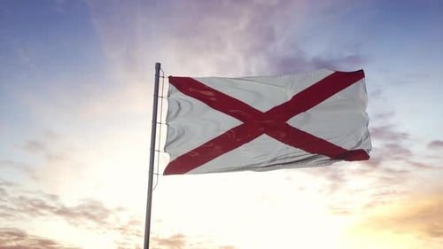 Waving Alabama State Flag with Cloudy Sunset Sky