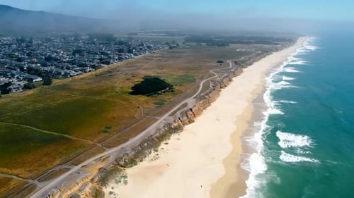 View From the Cliff on a Large Sandy Beach of the Pacific Ocean in California