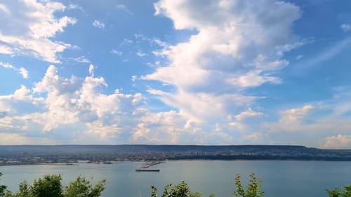 Cityscape with Beautiful Cloudy Sky Overlooking Ocean