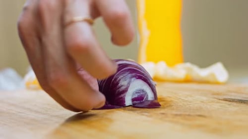 Chopping Fresh Red Onion with Sharp Knife