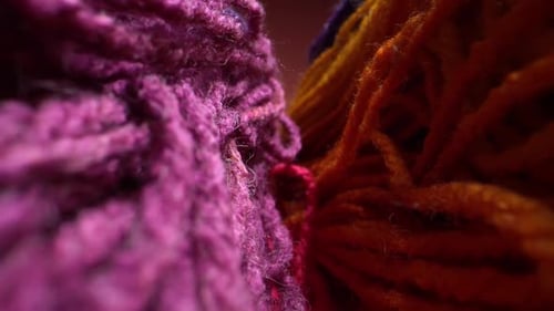 Macro Dolly Shot a Sliding Footage of a Beautiful Colored Wool Yarn Texture. May Be Used for