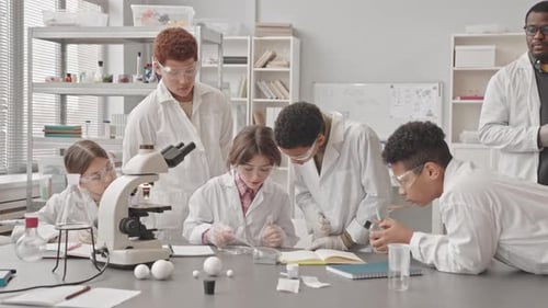 Students Doing Lab Research at Science Class