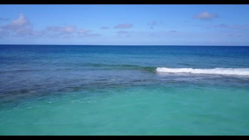 Aerial seascape of relaxing lagoon beach vacation by transparent water with white sandy background o