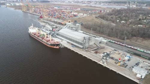 Cargo ship in port aerial view