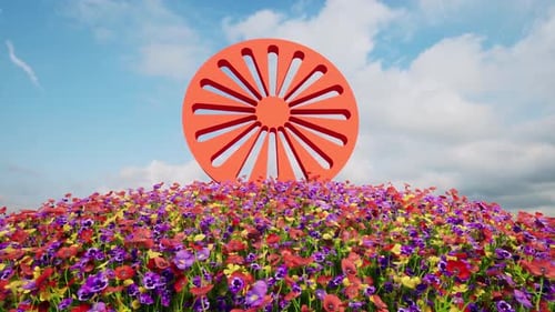 Concept de voyage de la journée internationale des Romani Herbe et fleurs de couleur