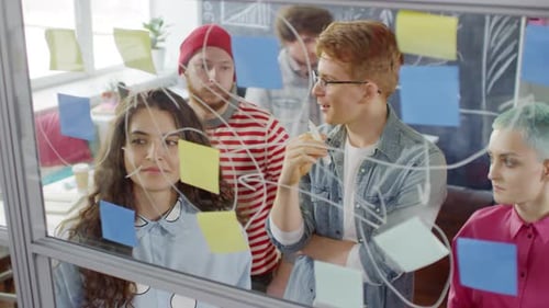 Creative Team Brainstorming Ideas in Modern Office