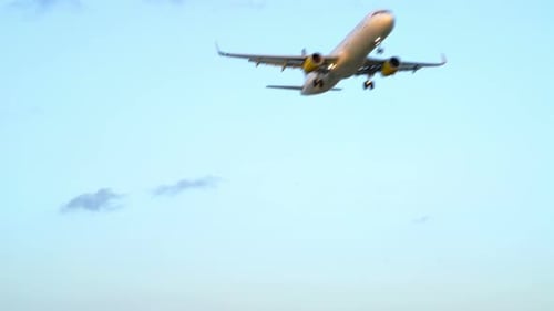 Passenger Plane Flying Overhead Preparing to Land