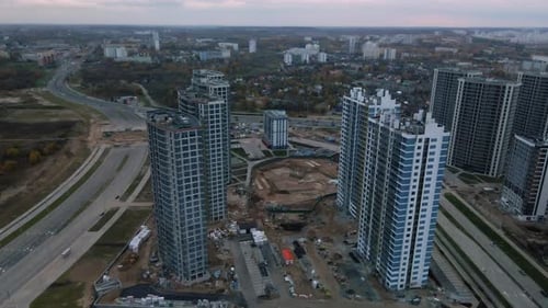 Construction of modern multi-storey buildings. Construction of a new city block.