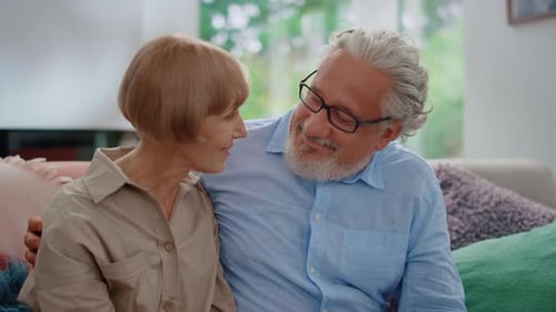 Senior Couple Sharing an Affectionate Moment at Home