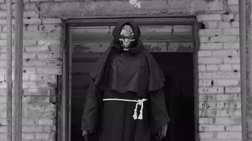 Grim Reaper Over Old Derelict Brick Building