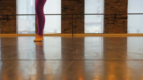 Dancing Feet Practicing Ballet Steps in Dance Studio