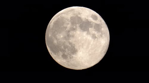 Full Moon Slowly Drifting in the Black Night