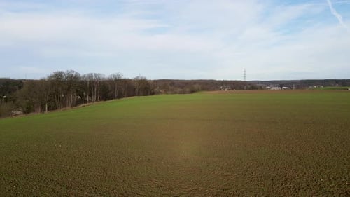 Areal View of Agricultural Field Against Cloudy Sky
