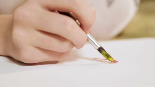 Hand Painting a Heart with Delicate Brushstrokes