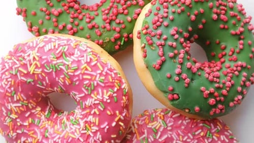Delicious Donuts with Colorful Frosting and Decorations