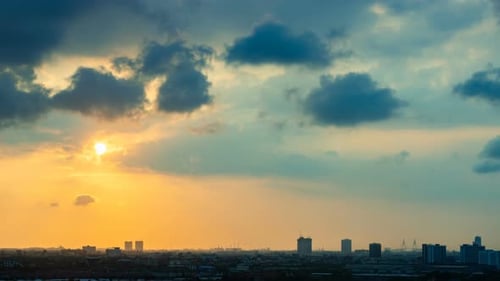 Golden Sunset Over Urban Skyline Time Lapse