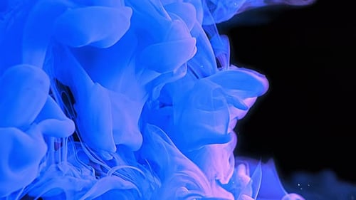 Abstract Deep Blue Ink Swirls on Black Background