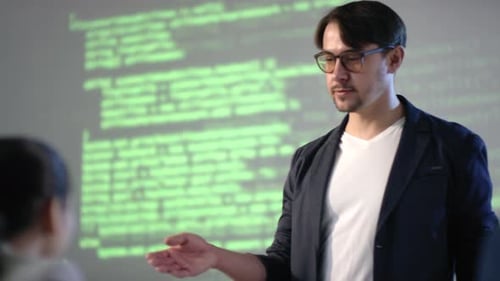 IT Teacher Explaining Material To Students