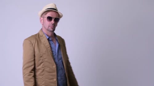 Happy Blonde Casual Businessman Greeting with Hat