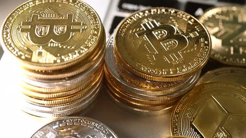 Bitcoins and Cryptocurrency on Computer Keyboard