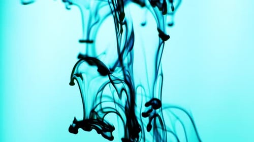 Black Ink Swirling in Pale Blue Liquid