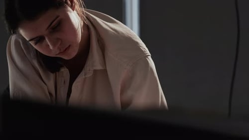 Focused Woman Working in a Workplace