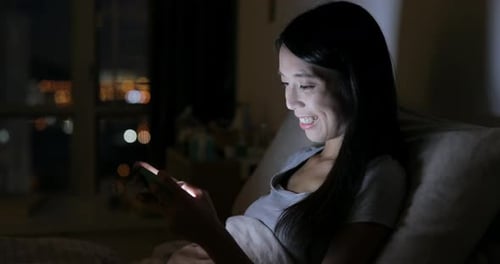 Woman using tablet computer