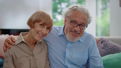 Happy Mature Couple Smiling Together Indoors