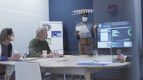 Professionals in Office Presenting Data and Information