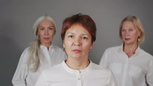 Portrait of Three Adult Girlfriends in Studio