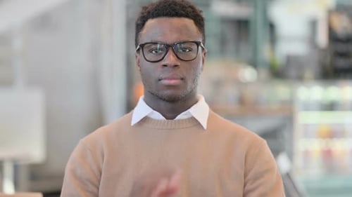 Creative African Man Showing No Sign By Shaking Head