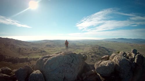 Hiker Traveller on Mountain Summit