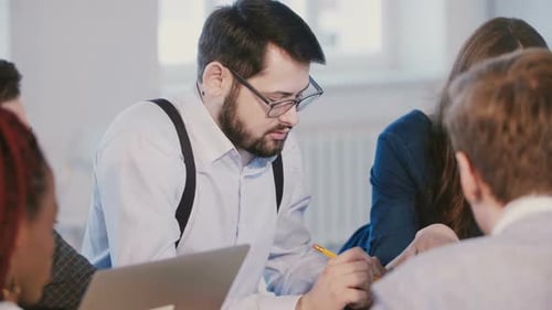 Colleagues Work Meeting Discussion in Workplace