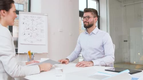 Employer Having Interview with Employee at Office 53