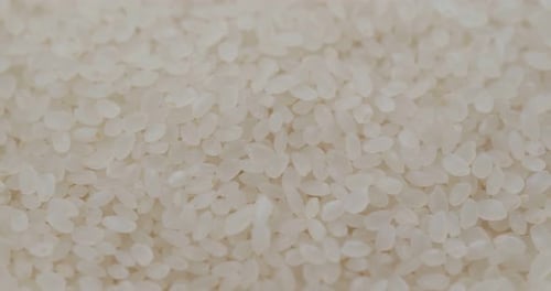 Stack of White Rice in Rotation