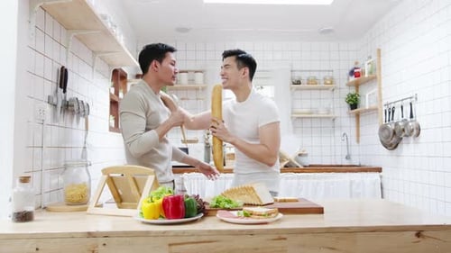Two Friends Singing with Bread in Kitchen