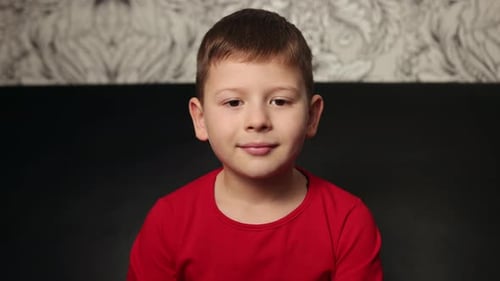 Close Up of a Boy Smiling at the Camera