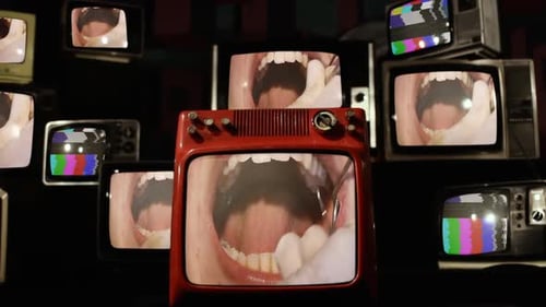 Old Televisions Showing Mouth and Static