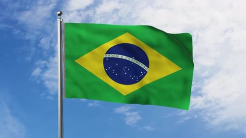 Waving Flag of Brazil Against a Clear Blue Sky