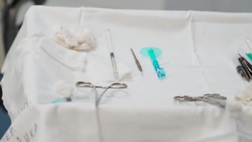 Surgery Tools on White Cloth at the Hospital