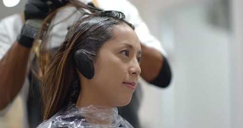 Woman Getting Hair Dyed at Salon