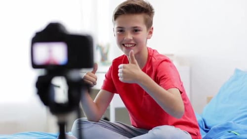 Teen Recording Video on Camera at Home