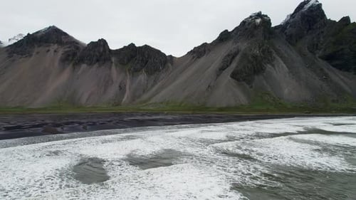 Drone Over Black Sand Beach Sea And Vestrahorn Mountain