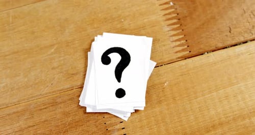 Question mark heap on table