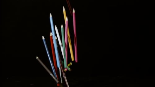 Colorful Pencils Falling in Slow Motion
